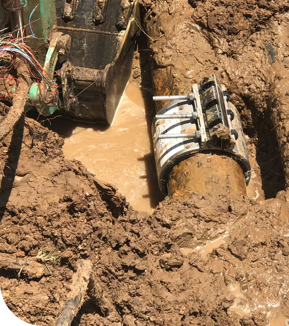 A Maya Global technician utilizing advanced acoustic sensors and headphones to perform precise leak detection on a municipal water system.